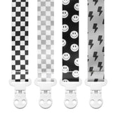 Stadela four-pack pacifier clips in unisex patterns for versatile on-the-go use.