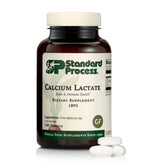 Standard Process Calcium Lactate bottle emphasizing bone density support in a vegan formula