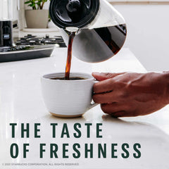 Starbucks Italian Roast hot coffee cup steaming with bold cocoa notes