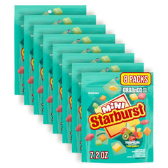 Starburst Minis Tropical Sunset bag open with colorful chews ready for sharing on the go