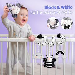 Starrykids elephant rattle in black and white encourages shaking and listening