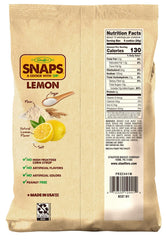 Close-up of STAUFFER'S Lemon SNAPS cookies highlighting zesty lemon bits and flaky edges.