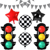 STJKRCLW race-car birthday balloons and traffic-light decor create an immersive track atmosphere for the party.