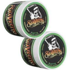 Hair being worked into shape with Suavecito Matte Pomade for natural texture.