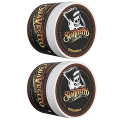 Hands scoop Suavecito Pomade Original for precise, even styling.
