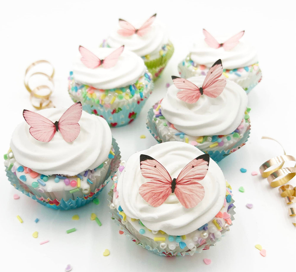 Sugar Robot edible butterfly cake topper pastel pink, ideal for sophisticated cake decorating.