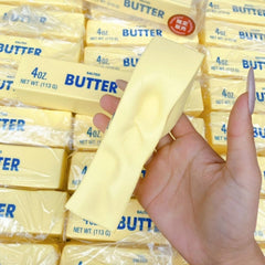 SUISUILE butter squishy toy in hand for portable relaxation.