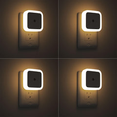 Sujeet Night Light 4-pack plugged in to wall outlet for soft hallway illumination