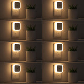 Sujeet Night Light 8-pack plugged into wall outlets for safe hallway illumination.