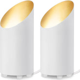 SUNVIE two-pack uplighting floor can light highlighting a wall with warm glow