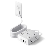 SUPERDANNY 15ft flat-plug extension cord behind a sofa for tidy setup.