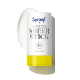 Supergoop Mineral Sheer Stick SPF 30 being applied on face for on-the-go protection