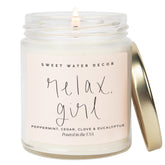 Sweet Water Decor Relax Girl candle in a 9oz jar creates a calming home ambiance.