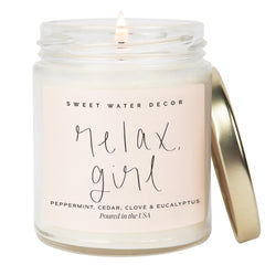 Sweet Water Decor Relax Girl candle in a 9oz jar creates a calming home ambiance.