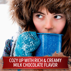 Pouring Swiss Miss hot cocoa into a mug creates a warm, comforting aroma.