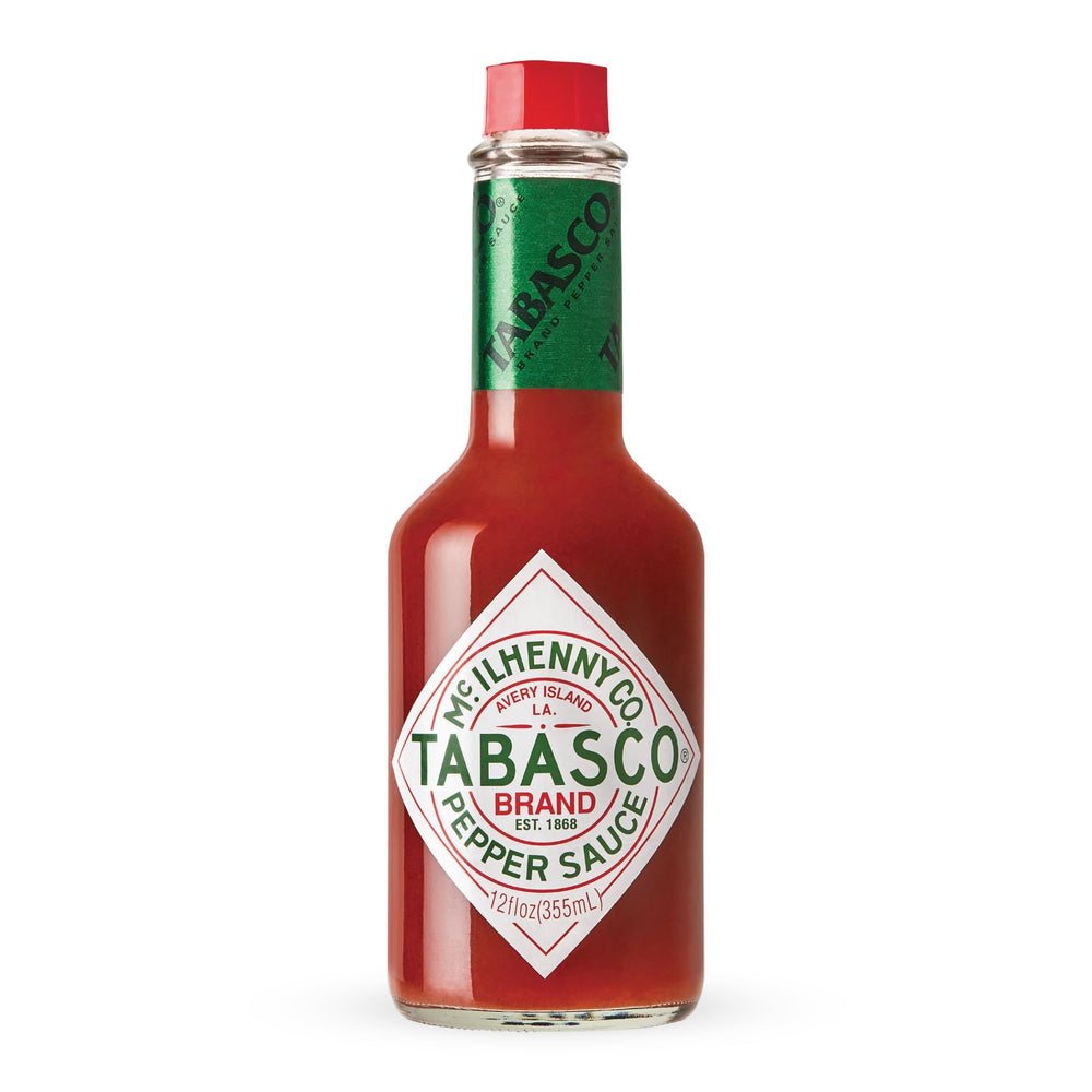 TABASCO Original Red bottle on shelf, a timeless pantry staple for bold flavor.