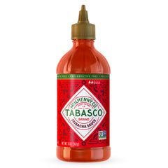 TABASCO Sriracha sauce 11 oz bottle on counter, bold flavor ready to pour