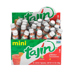 Tajin Clasico seasoning dusting on fruit and vegetables to boost flavor