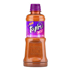 Tajín Twist bottle ready to sprinkle on fruits for a tangy kick.