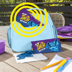 Takis Blue Heat mini bag opening with spill for quick snack access.