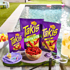 Takis Fuego rolls close-up texture reveals crisp, intensely seasoned chips.