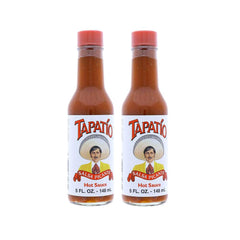 Tapatio Hot Sauce Original 5 oz bottle pour enhances tacos, eggs, and soups.