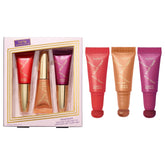 Tarte blush tape trio compact close-up reveals buildable berry color on the cheeks.