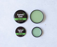 Tattoo Goo balm applied on skin with quick-absorbing formula.