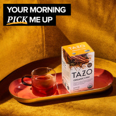 TAZO Organic Chai spice blend with ginger and cinnamon close-up.