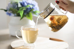 Teabloom borosilicate glass teapot shows clear brew and purity.
