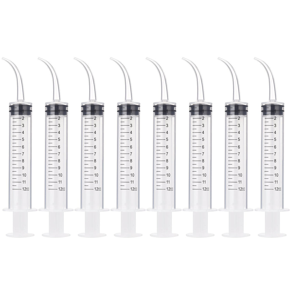 TecUnite 8-pack syringe with curved tip reaching tight dental spaces for irrigation.