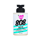 The Doux 808 Base Curl Defining Gel bottle pour boosts control on damp hair.