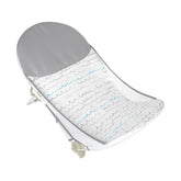 The First Years Sure Comfort folding bather open in sink for quick infant bath.