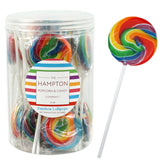 The Hampton rainbow lollipops 24-pack on display, ideal for party favors.