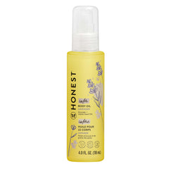 The Honest Company lavender-infused body oil bottle shown for soothing, hydrating baby skin.