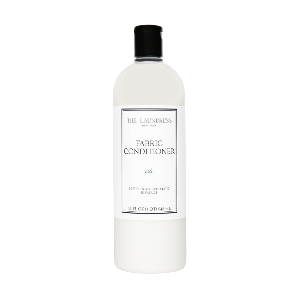 The Laundress Isle Fabric Conditioner bottle softens fabrics with Isle scent