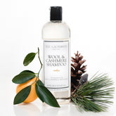 The Laundress Wool & Cashmere Shampoo bottle pour demonstrates gentle cleaning for delicate knits.