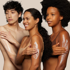 Hands applying The Lotion Company 24 Hour Skin Therapy for smooth coverage.