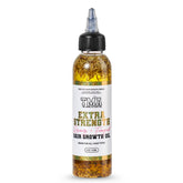 The Mane Attraction Extra Strength Rosemary Fenugreek Oil bottle pour nourishes the scalp and hair health.