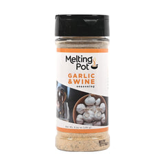The Melting Pot garlic and wine seasoning bottle on display for easy home flavoring
