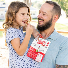 The New Primal Snack Mates Chicken and Apple Stick held for a portable protein moment.