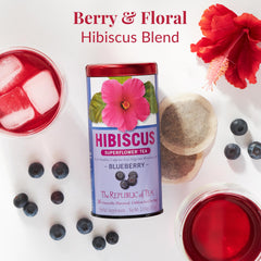 Close-up of hibiscus in The Republic of Tea Hibiscus Blueberry Superflower blend, vibrant petals.