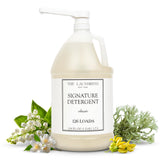 The Laundress Signature detergent gallon with pump enables easy dosing and high-capacity cleaning.