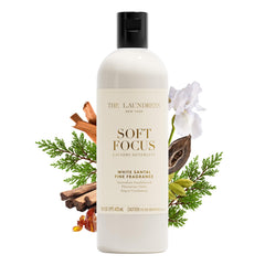 The Laundress Soft Focus bottle pours, releasing long lasting White Santal fragrance.