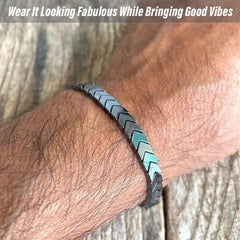 Closeup of hematite beads on Themerol Arrows Bracelet with protective coating