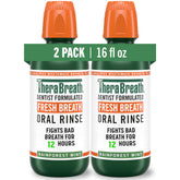 TheraBreath Rainforest Mint bottle on bathroom shelf for long-lasting freshness.