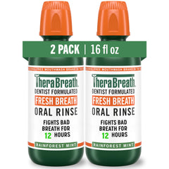 TheraBreath Rainforest Mint bottle on bathroom shelf for long-lasting freshness.