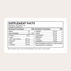Serving scoop with THORNE Amino Complex for precise pre or post-workout dosing.