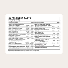 THORNE Women's Multi 50+ capsules close-up showcasing bone support nutrients.