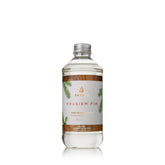 Thymes Frasier Fir diffuser oil refill bottle provides enduring pine aroma for a cozy space